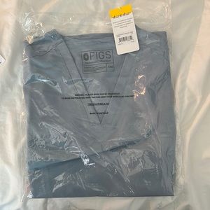 Wearfigs scrub top in style casma , color dusted blue, size xxs. Brand new!